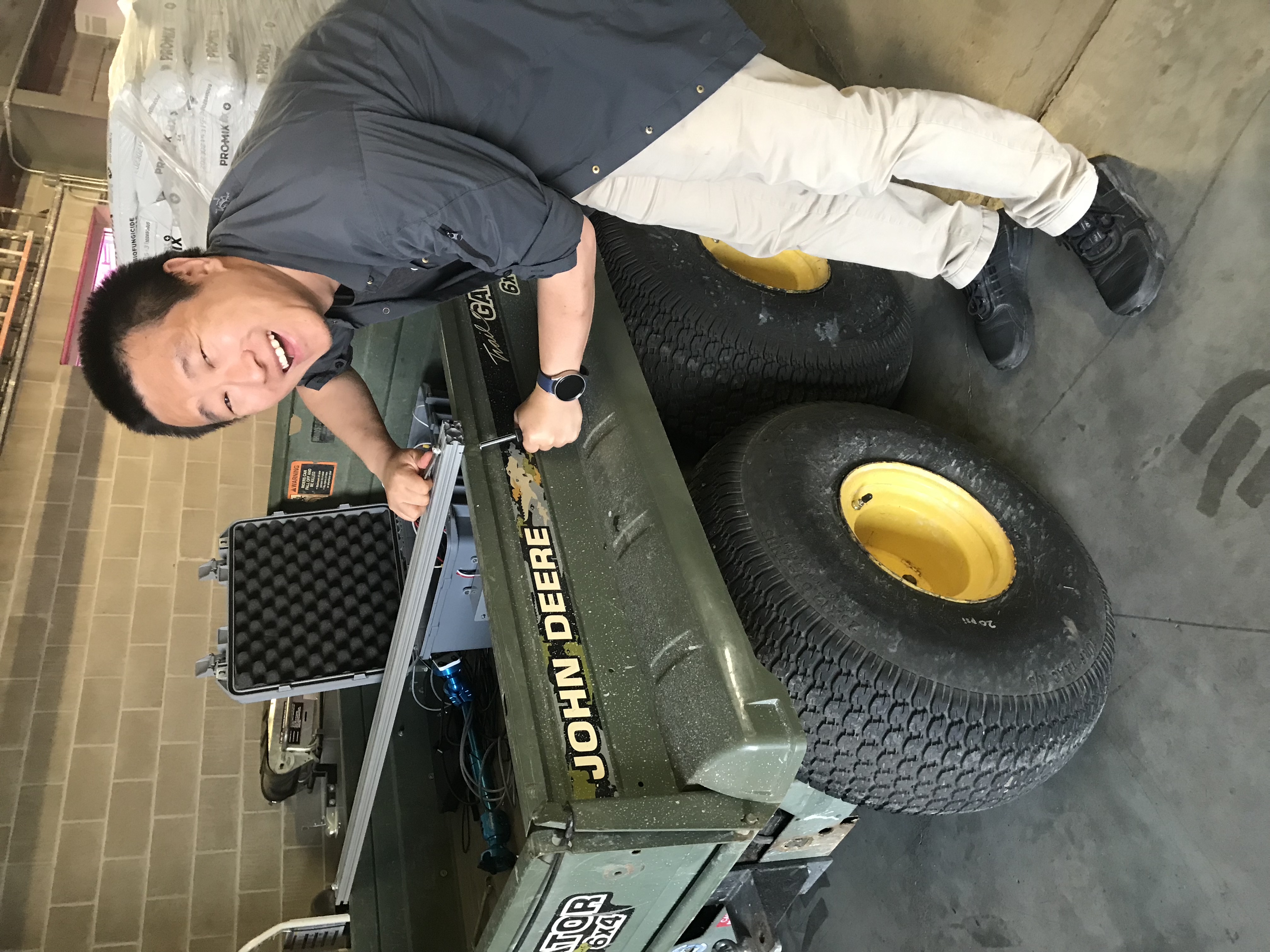 Image of Dr. Yu Jiang installing PPB imaging system on SDSU vineyard vehicle